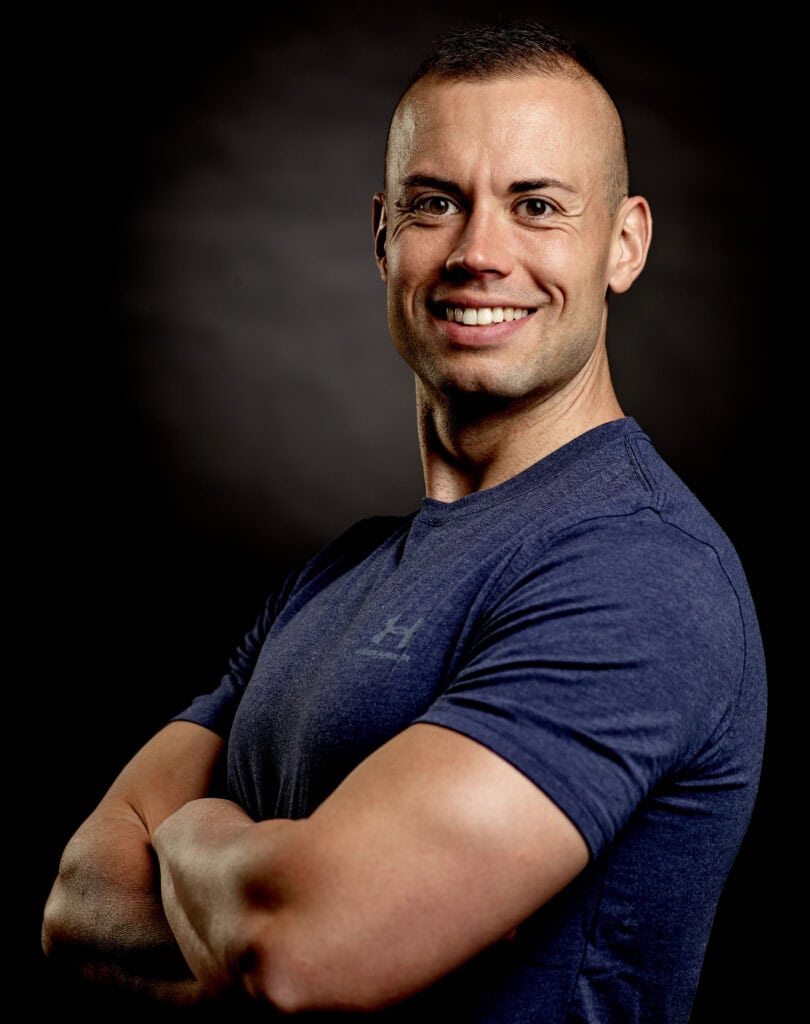 Portrait von Olaf Henning in einem dunkelblauen Sportshirt.